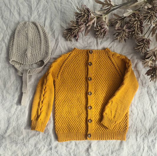 Mouk - Kinderjacke mit Zöpfen und Perlmuster