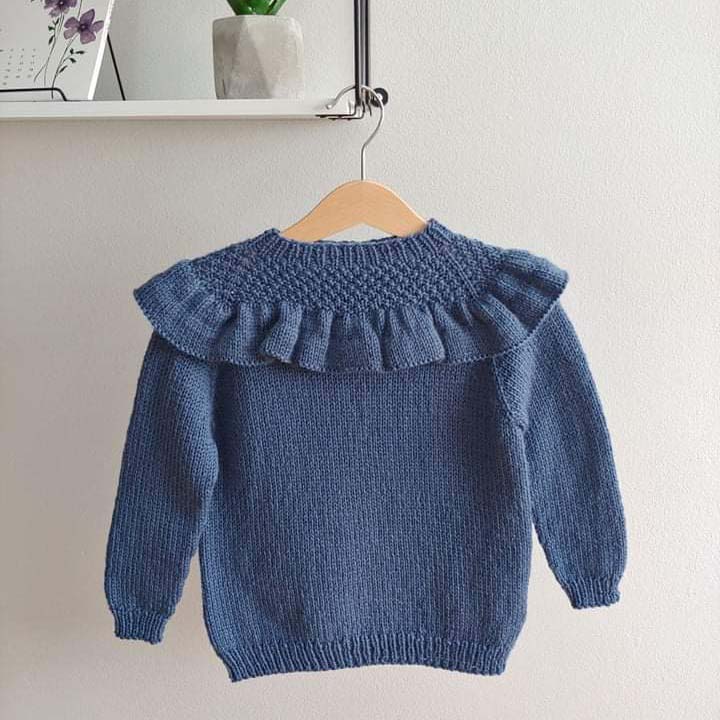 UNA - Kinderpullover mit Volant